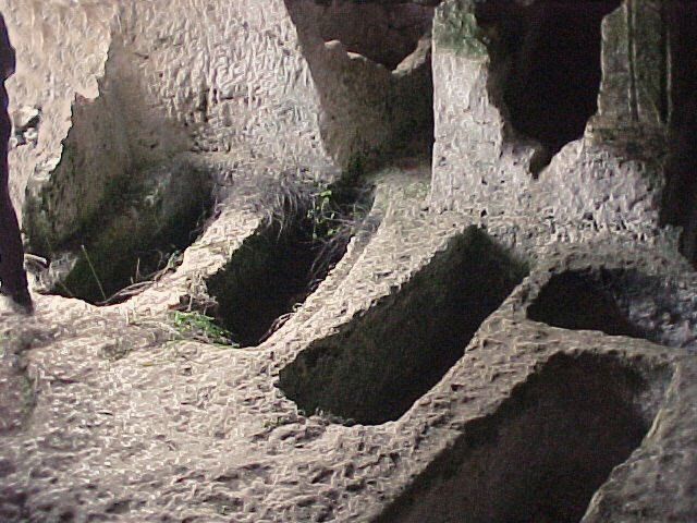 tombs into the caves