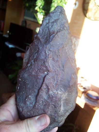 a biface , a two-sided stone tool (from  www.pantalica.org  )